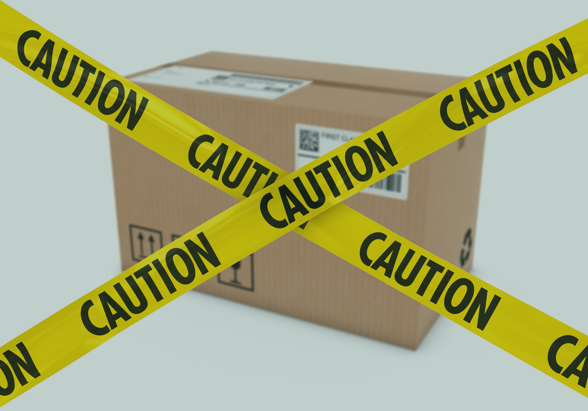 Cardboard_Box_Behind_Caution_Tape_Cross.jpg